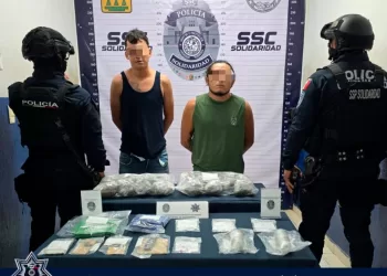 Sorprenden a dos motociclistas que intercambiaban droga