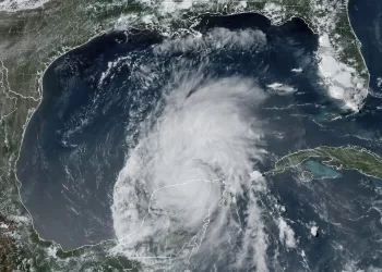 This GOES-16 GeoColor satellite image taken at 4:16 p.m. EDT on Friday, July 5, 2024, and provided by NOAA, shows Hurricane Beryl over Mexico’s Yucatan Peninsula. Texas officials urged coastal residents to prepare as the storm moves toward the Gulf of Mexico.  (NOAA via AP)