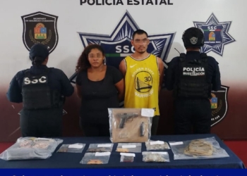 Pareja es detenida con drogas y un arma