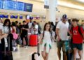 Pasajeros en el Aeropuerto Internacional de Cancún